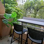Terra Private Studio With Balcony Wifi Ac Smart Tv Kitchenette Washing Machine